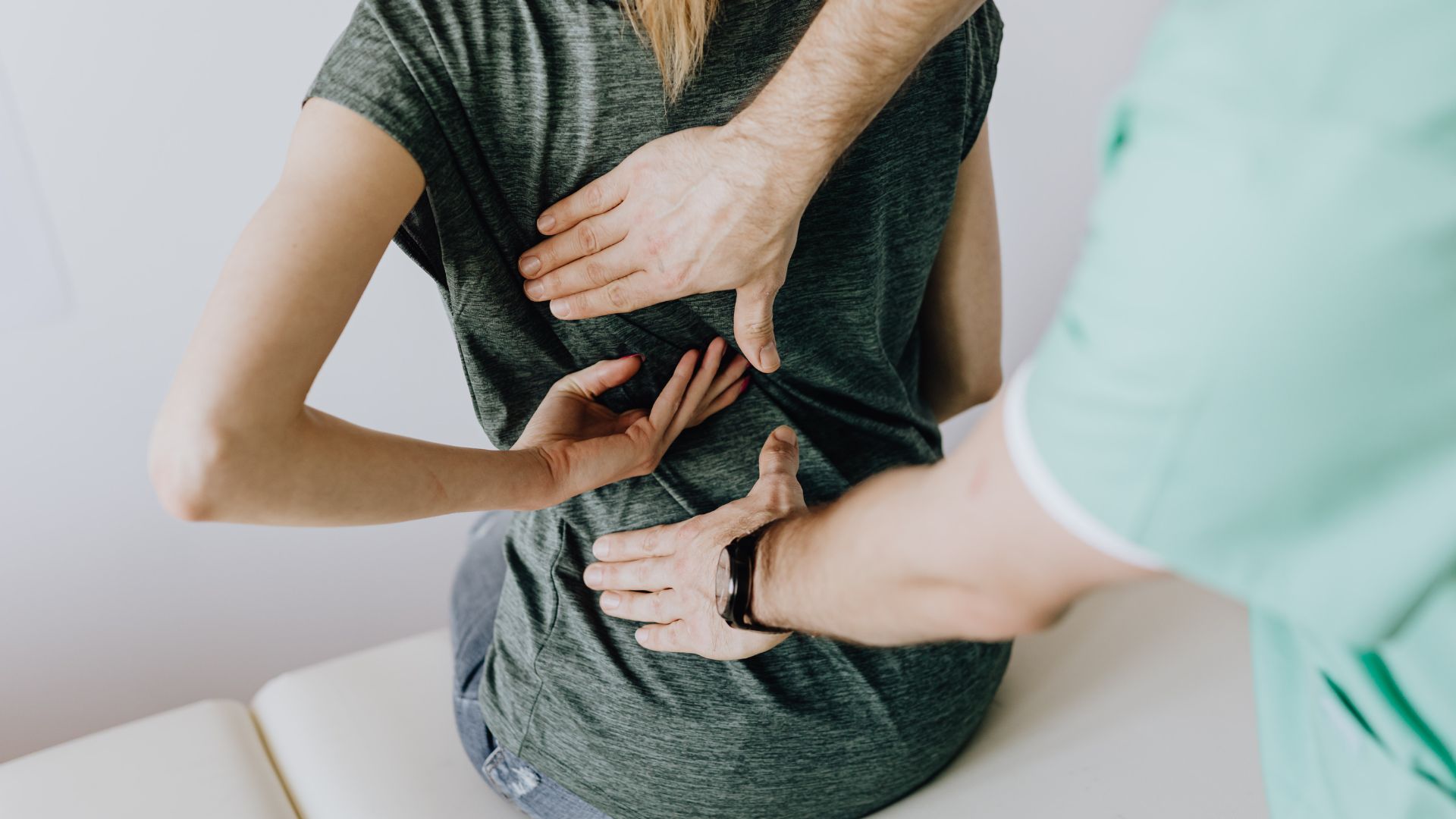 Header – Pricing Chiropractic spine treatment on patient
